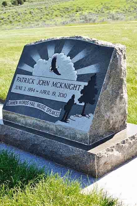 Granite slant headstone on base in a Nevada cemetery